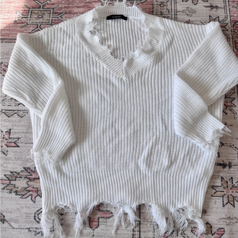 Women’s scalloped edge sweater